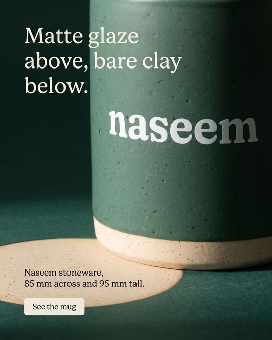 A generated image ad for the Naseem everyday mug: the mug close up, with the headline "Matte glaze above, bare clay below."